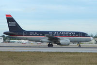N738US @ MIA - US Airways A319 about to depart Miami