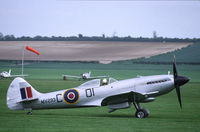 G-SPIT @ EGSU - Silvercoloured Spitfire MV293 at Duxford, UK. - by Henk van Capelle