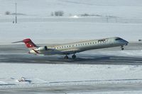 N914XJ @ CID - CRJ9 departing Runway 31