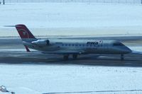 N8936A @ CID - Departing Runway 31.  Not good lighting - shooting into the sun with blowing snow - by Glenn E. Chatfield