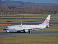 B-18615 @ RJCC - Boeing 737-809/China Airlines/Chitose - by Ian Woodcock