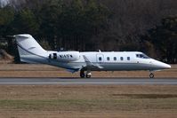 N141FM @ ORF - Tactical Air LLC 1982 Gates Learjet 55 N141FM rolling out on RWY 23 after arrival from New York La Guardia (KLGA). - by Dean Heald