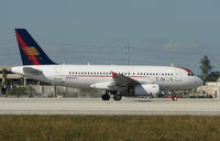 N521TA @ MIA - Taca A319 at Miami - by Terry Fletcher