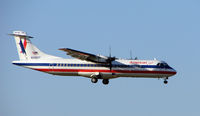 N342AT @ MIA - American Eagle ATR72 prepares for touchdown at Miami