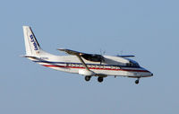 N380MQ @ MIA - Skyway Shorts 360 prepares to land at Miami