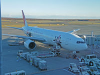 JA8984 @ RJCC - Boeing 777-246/JAL/Chitose - by Ian Woodcock