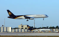 N456UP @ MIA - UPS B757 about to touchdown adjacent its home ramp at Miami - by Terry Fletcher