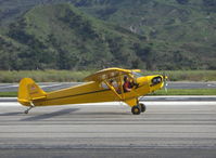 N98425 @ SZP - 1946 Piper J3C-65 CUB, Continental C90 upgrade, taxi off Rwy 22 after landing - by Doug Robertson