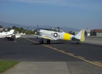 N817TX @ SZP - 1942 North American AT-6D TEXAN 'Problem Child', P&W R-1340 600 Hp, to transient parking - by Doug Robertson