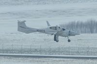 N244TS @ CID - 3/8th to 1/2 mile away from the tower, Landing Runway 27