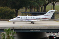 N654AP @ TPA - Beejet 400 taxies over the inter-connecting bridge at Tampa
