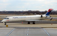 N398CA @ PHL - Comair CRJ  rests between services to/from Philadelphia - by Terry Fletcher
