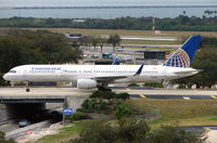 N17105 @ TPA - Continental B757 with wingtips taxies to stand at Tampa - by Terry Fletcher