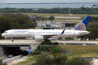 N17105 @ TPA - Continental B757 with wingtips taxies to stand at Tampa