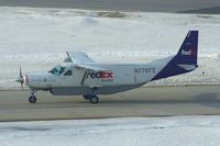 N776FE @ CID - MTN8955 Taxiing to Runway 27 for departure to Indianapolis - by Glenn E. Chatfield