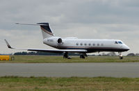 N572EC @ EGGW - Gulfstream G550 about to depart Luton - by Terry Fletcher