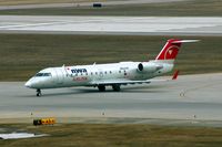 N8444F @ CID - Taxiing in off Runway 9 - by Glenn E. Chatfield
