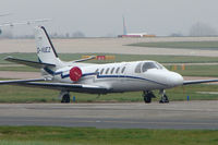 G-VUEZ @ EGCC - Cessna 550 parked on the remote executive ramp at Manchester - by Terry Fletcher