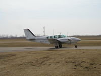 N463KB @ KLVN - Taxiing to Runway 12. - by Mitch Sando