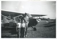 N1297E @ BRIZEE FIE - This was our family plane back in the early 1960's - From left to right is my brother, me and my Dad - by Mom