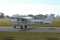 G-BJWI @ EGHH - TAXIING TO RUNWAY 26 - by Patrick Clements