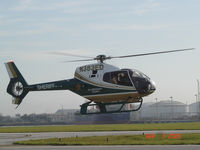 N383ED @ KTPF - EC 120 hovering - by Luc Pieterbourg