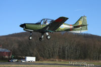 N747BD @ 7B9 - The dog makes a low approach over Ellington, CT - by Dave G