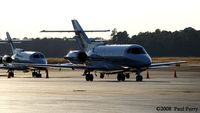 N517LR @ ISO - Lots of biz-jets parked about today - by Paul Perry