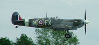 G-PMNF @ EGKB - Spitfire landing at Biggin Hill - by Barry Burston
