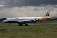 G-OZBB @ EGCC - Taken at Manchester Airport on a typical showery April day - by Steve Staunton