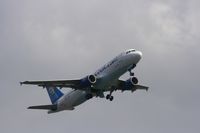 G-OMYA @ EGCC - Taken at Manchester Airport on a typical showery April day - by Steve Staunton