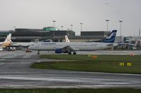 OH-LZB @ EGCC - Taken at Manchester Airport on a typical showery April day - by Steve Staunton