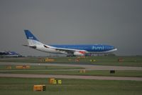 G-WWBM @ EGCC - Taken at Manchester Airport on a typical showery April day - by Steve Staunton