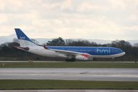 G-WWBM @ EGCC - Taken at Manchester Airport on a typical showery April day - by Steve Staunton