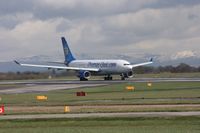 G-MLJL @ EGCC - Taken at Manchester Airport on a typical showery April day - by Steve Staunton