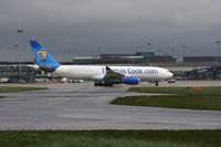 G-OMYT @ EGCC - Taken at Manchester Airport on a typical showery April day - by Steve Staunton