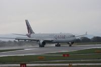 A7-AEJ @ EGCC - Taken at Manchester Airport on a typical showery April day - by Steve Staunton