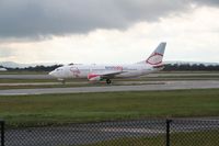 G-OGBE @ EGCC - Taken at Manchester Airport on a typical showery April day - by Steve Staunton