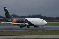 G-ZAPW @ EGCC - Taken at Manchester Airport on a typical showery April day - by Steve Staunton