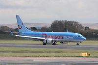 G-FDZD @ EGCC - Taken at Manchester Airport on a typical showery April day - by Steve Staunton