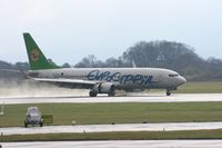 5B-DBR @ EGCC - Taken at Manchester Airport on a typical showery April day - by Steve Staunton