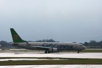 5B-DBR @ EGCC - Taken at Manchester Airport on a typical showery April day - by Steve Staunton