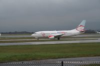 G-TOYJ @ EGCC - Taken at Manchester Airport on a typical showery April day - by Steve Staunton