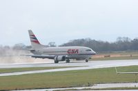 OK-XGA @ EGCC - Taken at Manchester Airport on a typical showery April day - by Steve Staunton
