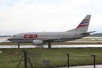 OK-XGA @ EGCC - Taken at Manchester Airport on a typical showery April day - by Steve Staunton