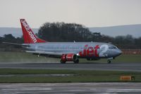 G-CELU @ EGCC - Taken at Manchester Airport on a typical showery April day - by Steve Staunton