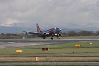 G-CELU @ EGCC - Taken at Manchester Airport on a typical showery April day - by Steve Staunton