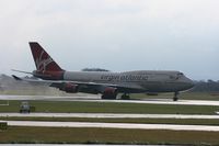 G-VAST @ EGCC - Taken at Manchester Airport on a typical showery April day - by Steve Staunton