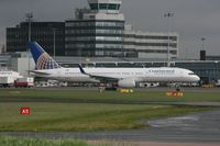 N26123 @ EGCC - Taken at Manchester Airport on a typical showery April day - by Steve Staunton