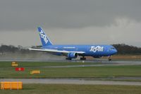 C-GZUM @ EGCC - Taken at Manchester Airport on a typical showery April day - by Steve Staunton